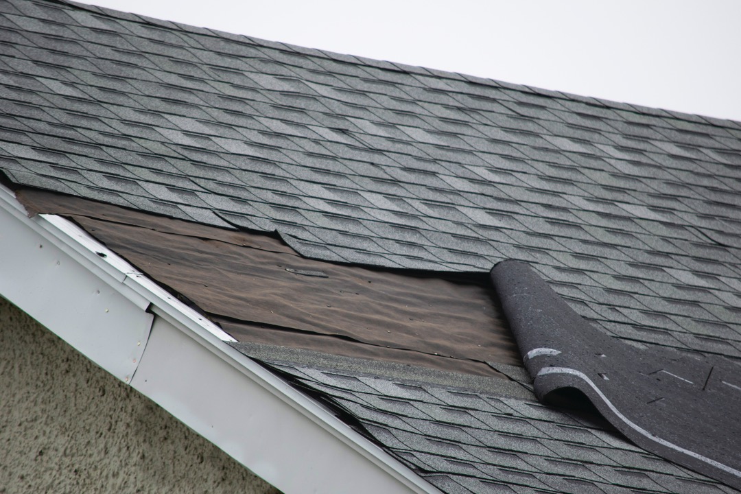 Damaged shingles on the roof of a house in Ravenswood, Chicago